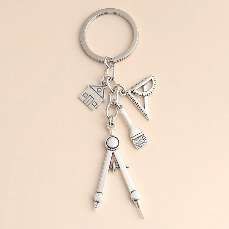 Multifunctionele zilveren sleu - Compass Keychain Mini recensie en prijs