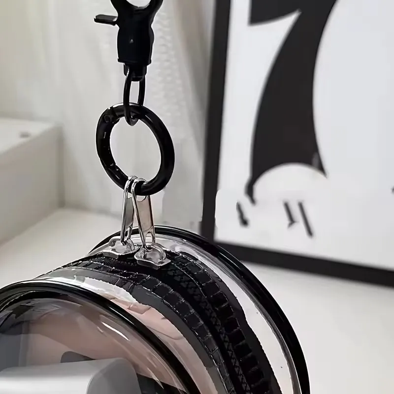 Kabelopberger voor oordopjes,  - Cable Winder Keychain recensie en prijs